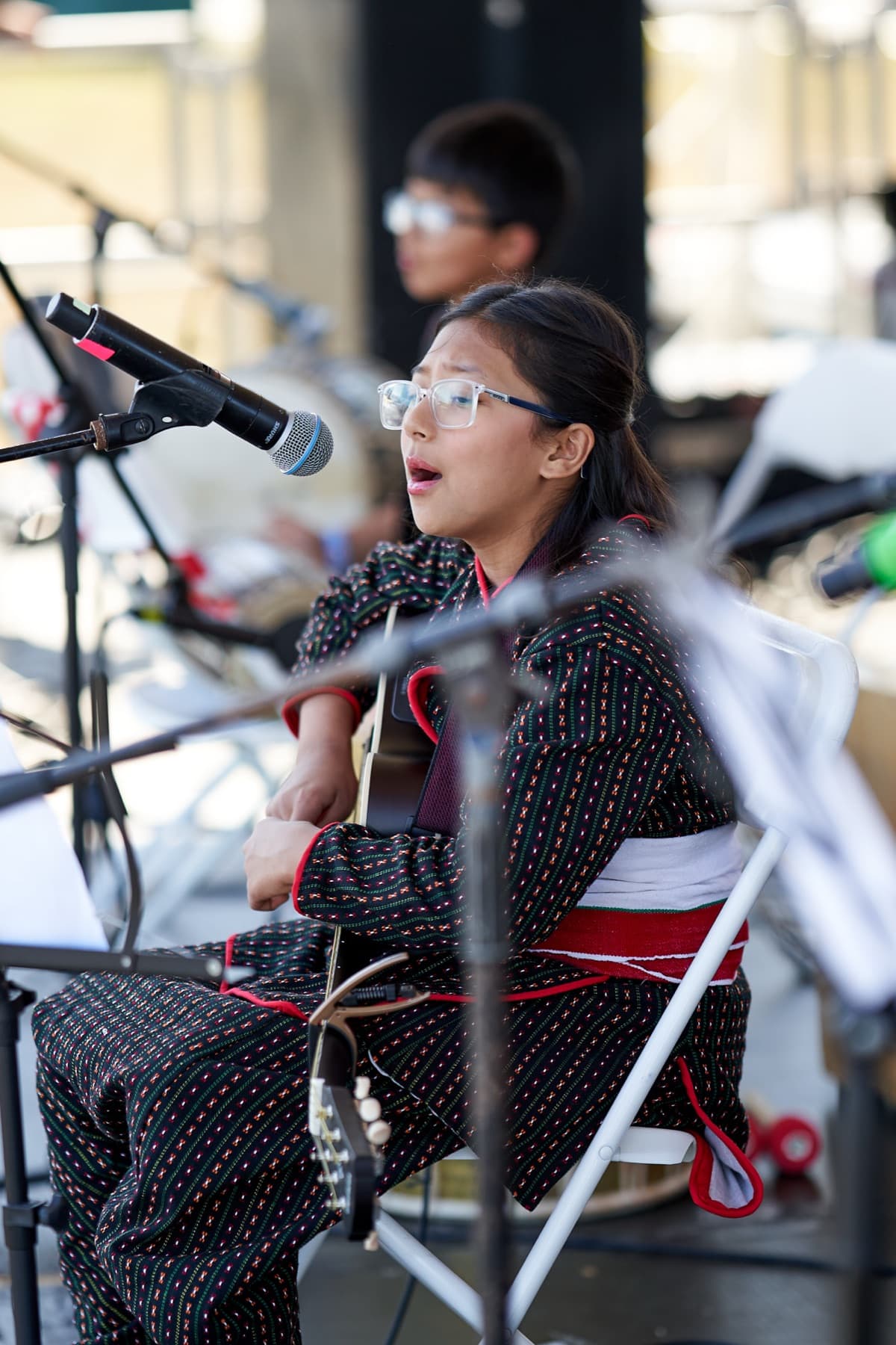 Folk guitarist on stage